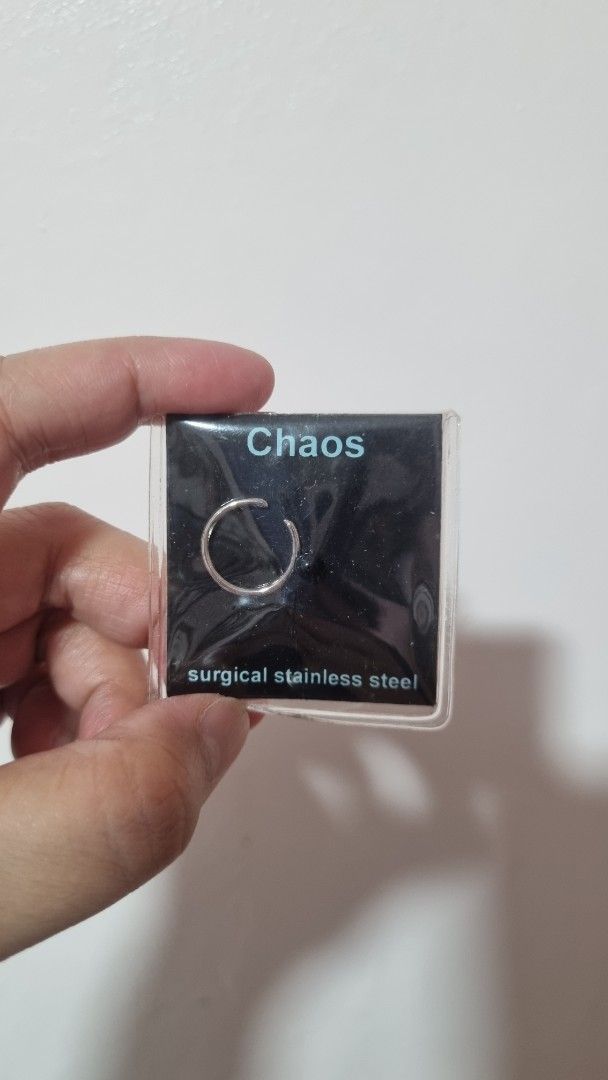 Chaos Surgical Stainless Steel Captive Ring (Category: Earrings) located in Rizal. Submitted by declutteringmomma_ (Listing ID 1466284357, Image 1). Description: - Brand: Chaos - Type: Captive ring - Material: Surgical stainless steel - Size: 18 gauge by 1/2 inch wide - Detail: 4mm hematite bead - Condition: Brand new, unopened packaging in original plastic display box.