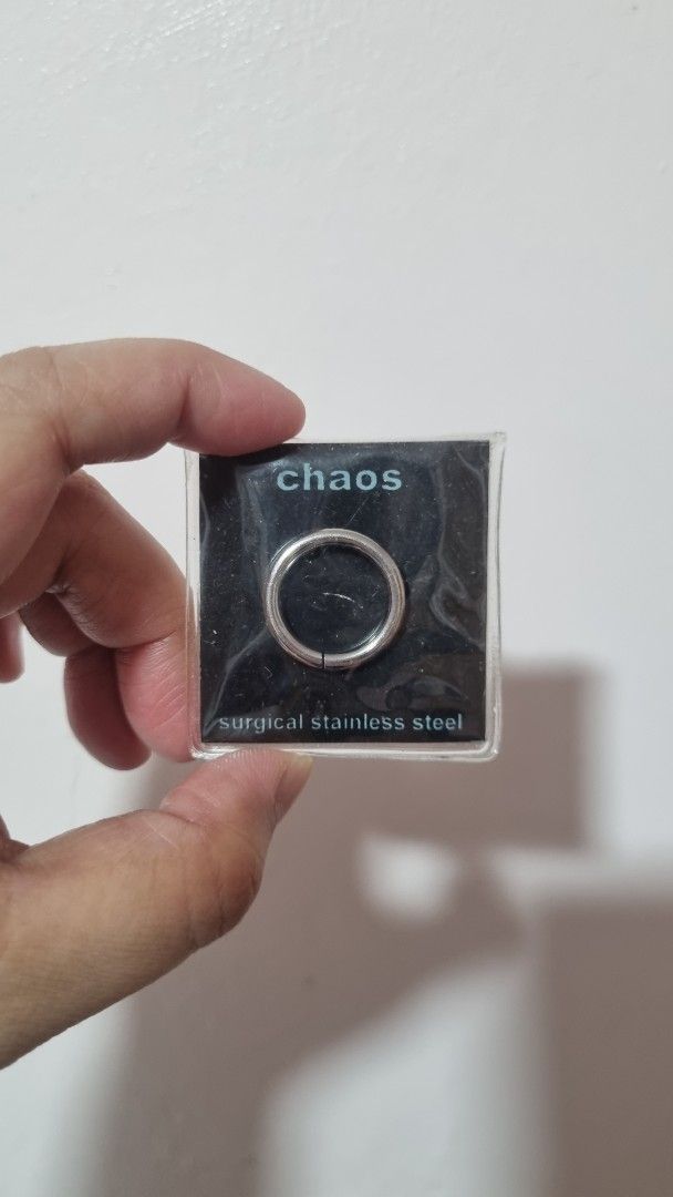 Chaos Surgical Steel Seamless Ring (Category: Earrings) located in Rizal. Submitted by declutteringmomma_ (Listing ID 1466283951, Image 1). Description: - Brand: Chaos - Type: Seamless body piercing ring - Material: Surgical steel - Size: 10GA (5/8 inch width) - Condition: Brand new, still sealed in original box.