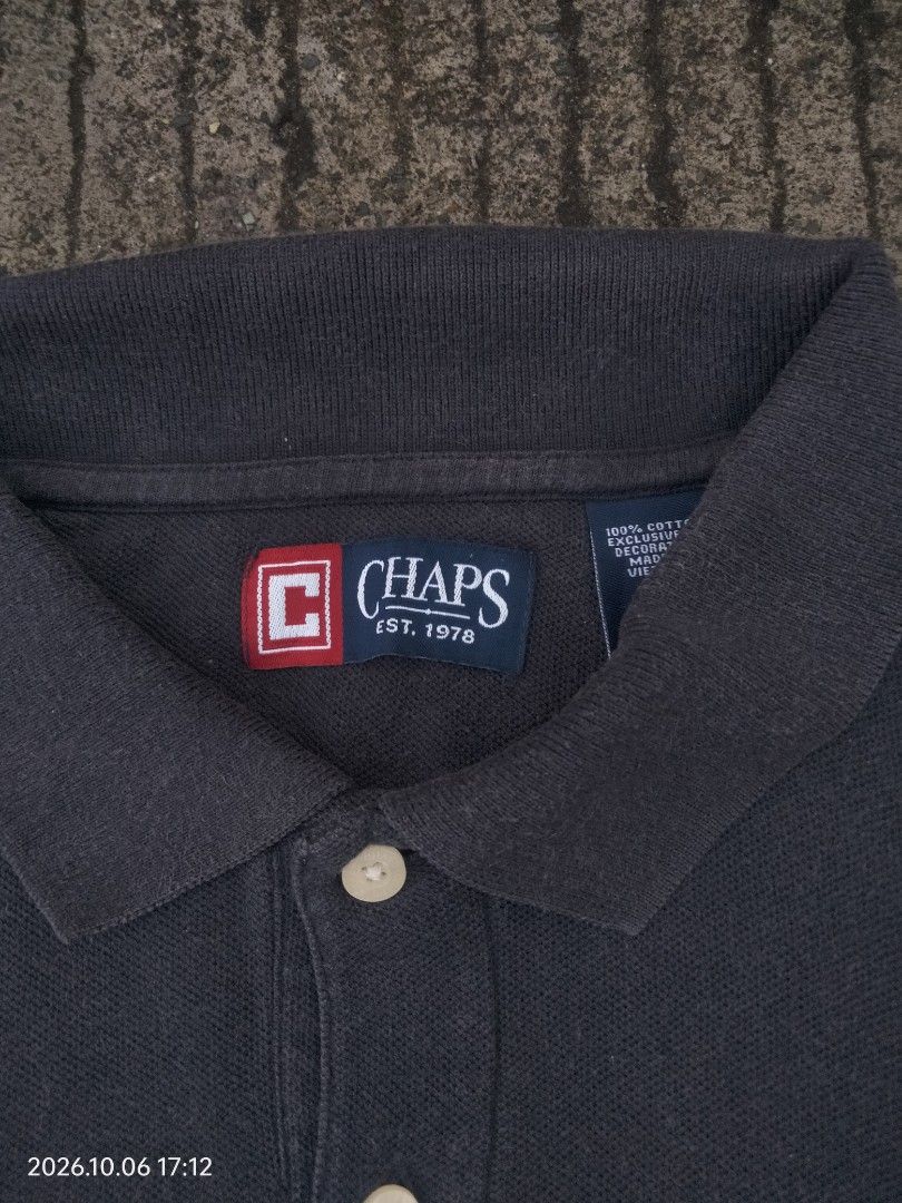 Chaps Polo Shirt (Category: Tshirts & Polo Shirts ) located in Caloocan City. Submitted by haruconcep52476 (Listing ID 1461063265, Image 2). Description: Dimensions W23 ×L28 Good condition Color rate 9 Need wash - Classic Chaps polo shirt - Short sleeves with collar and 2-button placket - Features embroidered Chaps logo on chest - Made from comfortable cotton material - Perfect for casual or smart-casual outfits.