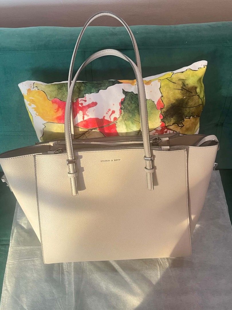 charles & keith (Category: Tote Bags) located in Manila. Submitted by thebageditph (Listing ID 1466219541, Image 1). Description: 👜 CHARLES & KEITH TOTE BAG — PRELOVED ✨ Pre-loved | Almost New ✨ Used only once ✨ Clean and well-maintained ✨ Elegant cream/beige color ✨ Spacious and perfect for everyday use, work, or occasions 📌 Condition: 9.5/10 — Like New.