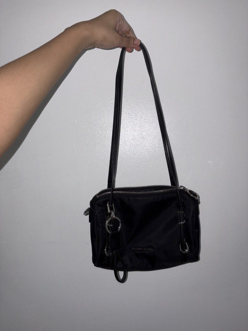 Charles & keith (Category: Shoulder Bags) located in Rizal. Submitted by prelovedbykristel (Listing ID 1466299681, Image 2). Description: with dustbag! :) MOP : gcash/ bdo MOD : lalamove ❌ no refund! :).