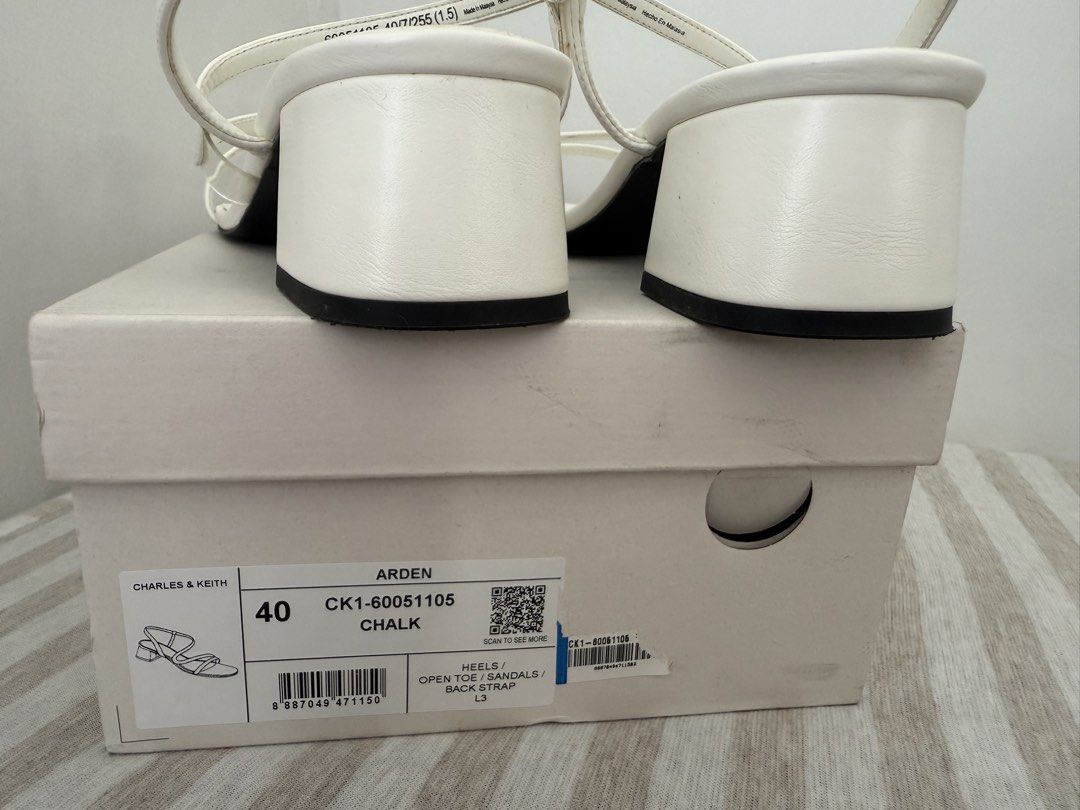 Charles & Keith Arden Chalk Sandals Size 40 (Category: Heels) located in Manila. Submitted by mollichie (Listing ID 1466217970, Image 3). Description: Charles & Keith Arden sandals in chalk white. Open toe design with multiple thin straps and a back strap. Chunky low block heel. Size 40. Original shoe box included. Only used once on my Civil Wedding..