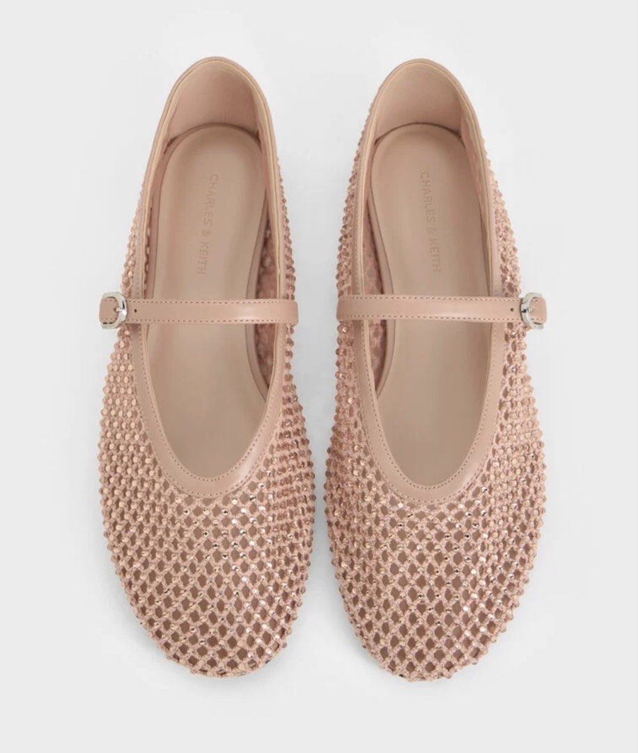 Charles & Keith Crystal Mary Jane Flats (Category: Flats & Sandals) located in General Santos City (Dadiangas). Submitted by wangmeixia68903 (Listing ID 1466182733, Image 1). Description: - Brand: Charles & Keith - Style: Mesh Mary Jane flats with sparkling rhinestones - Color: Nude pink - Details: Thin ankle strap with silver buckle, low flat heel, rubber outsole - Condition: Clean insoles with visible brand stamping - Versatility: Comfortable s
