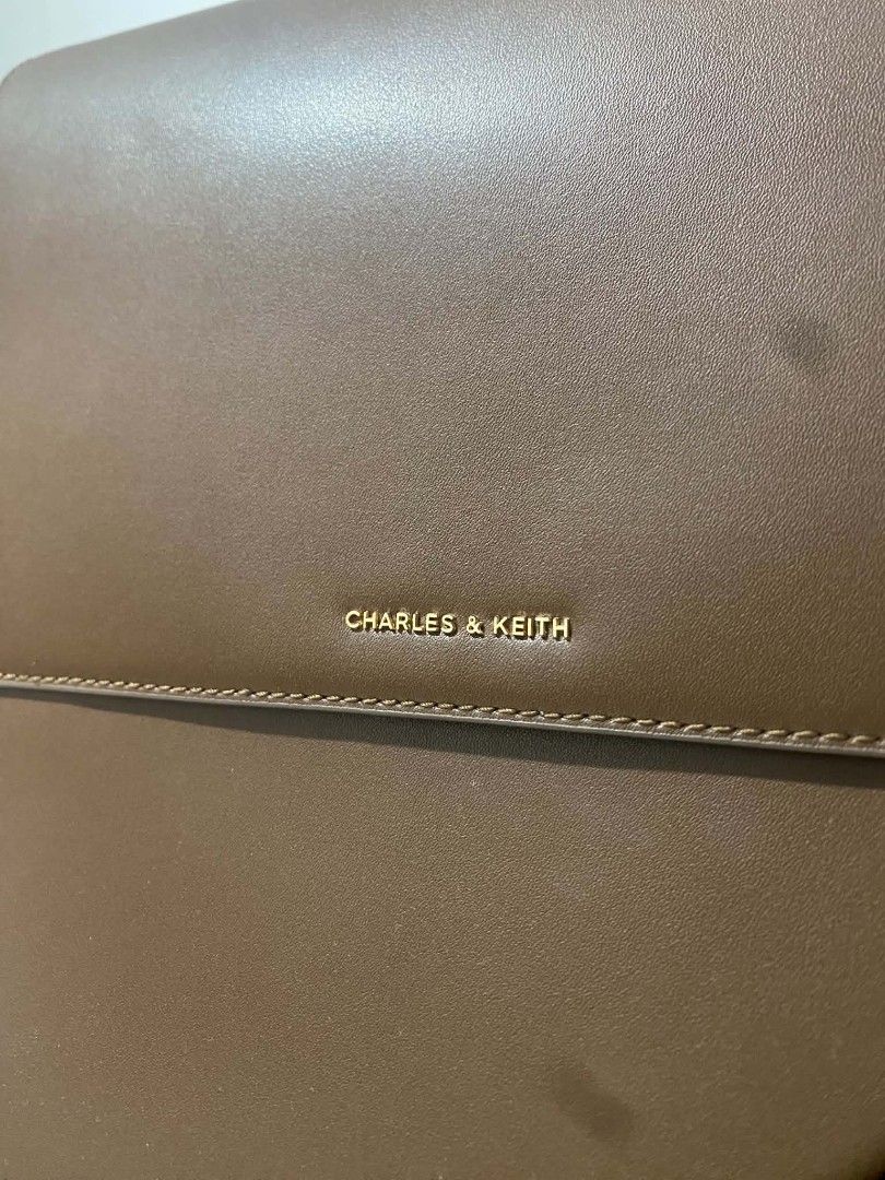 Charles & Keith Octavia Backpack (Category: Backpacks) located in Manila. Submitted by royalwater-108816 (Listing ID 1466157200, Image 2). Description: FOR SALE ‼️ CHARLES AND KEITH OCTAVIA BACKPACK (1 Backpack + 2 Detachable straps + Dust Bag) - used rarely (bought last april 2026 only) - Selling Price P4,500 (Bought it 5,000) slightly negotiable -RSF: Rarely used and need funds MEET UP: Any Lrt 1 Station.