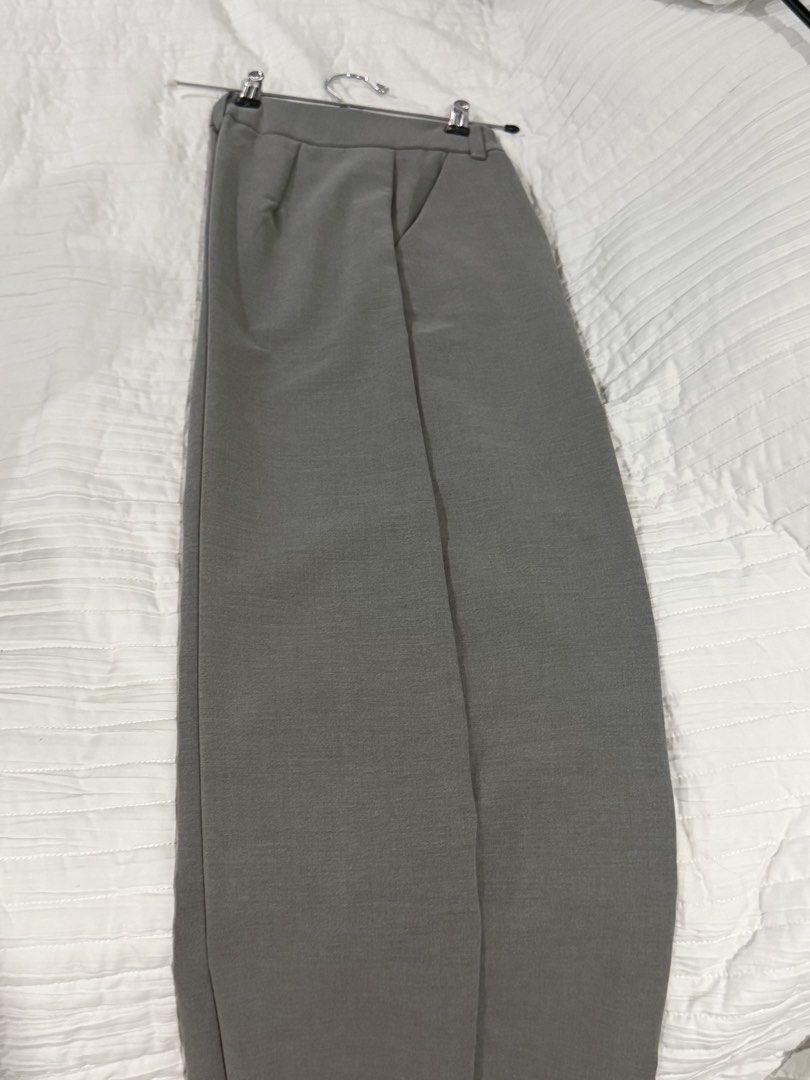 Charlotte Irony Grey Trousers Size M (Category: Other Bottoms) located in Quezon City. Submitted by afternoonstore (Listing ID 1466211180, Image 1). Description: - Brand/Model: Charlotte IronyThailand - Color: Grey - Size: Medium - Fit: Straight leg with pleated front - Waistline: Simple with clean construction - Style: Versatile daily wear piece.