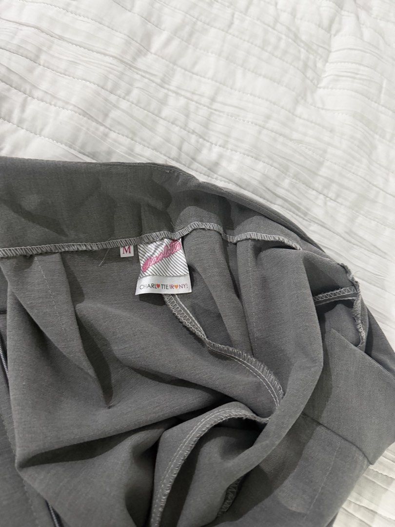 Charlotte Irony Grey Trousers Size M (Category: Other Bottoms) located in Quezon City. Submitted by afternoonstore (Listing ID 1466211180, Image 2). Description: - Brand/Model: Charlotte IronyThailand - Color: Grey - Size: Medium - Fit: Straight leg with pleated front - Waistline: Simple with clean construction - Style: Versatile daily wear piece.