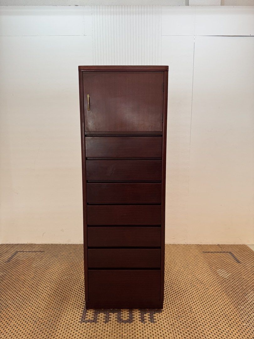Chest of drawers (Category: Shelves, Cabinets & Racks) located in Quezon City. Submitted by matetdevis13 (Listing ID 1466330619, Image 1). Description: Tall Wooden Chest of Drawers with Upper Storage Cabinet Price: 6,500 L23.5 x W18 x H70.5 In good condition Code JMD20-M441.