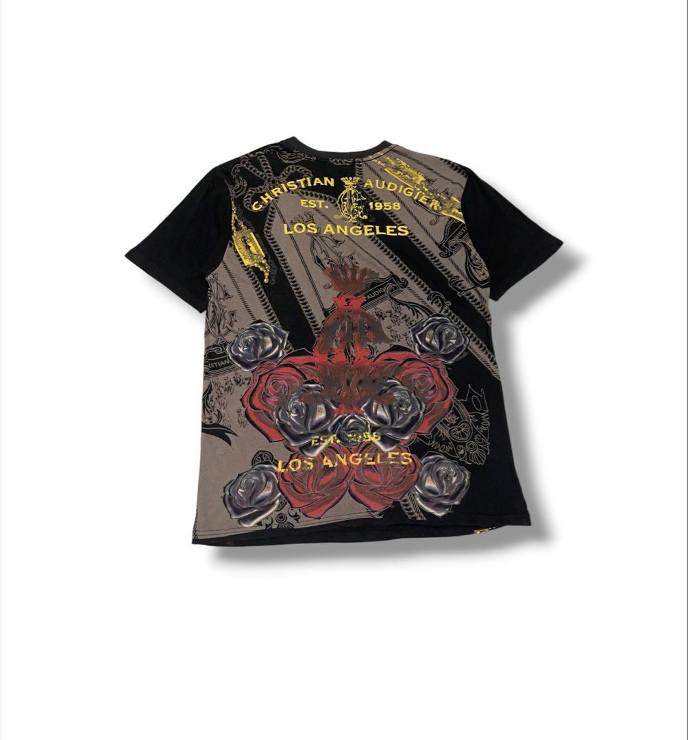 Christian Audigier Rhinestones Tee (Category: Tshirts & Polo Shirts ) located in Bulacan. Submitted by sanjisthrift (Listing ID 1466315039, Image 2). Description: Size XL Width 20 Length 28 Good Condition 9/10 Good fade.