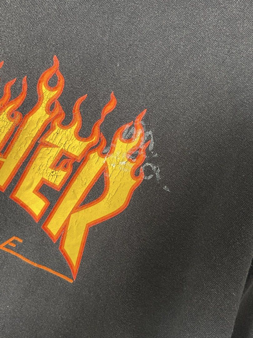Classic Thrasher Graphic Shirt (Category: Tshirts & Polo Shirts ) located in Imus. Submitted by mochi.rella (Listing ID 1466258382, Image 2). Description: Black Thrasher Fair Condition | Print Transfer XL on tag | Fit L W 23 | L 30 .