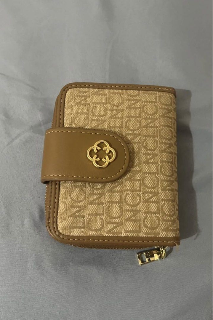 CLN Kathie Wallet Beige Woven (Category: Wallets & Card holders) located in Bacolod City. Submitted by k8tk4t_ (Listing ID 1466317249, Image 2). Description: - Brand: CLN (Kathie design) - Color/Pattern: Chic beige woven pattern - Features: Multiple card slots, ID window, and secure zip coin pocket - Hardware: Elegant gold-tone with clasp closure - Condition: Brand new / Great quality - Original Retail Price: ₱799 -Selling for:₱650 only BCD.