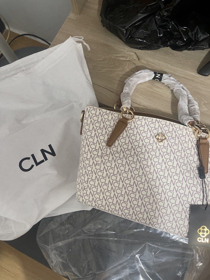 CLN Vienne Handbag Van Tan-X Monogram Tote (Category: Luxury Bags & Wallets) located in Manila. Submitted by jvlni (Listing ID 1466334058, Image 3). Description: - Brand: CLN - Model: Vienne Handbag - Colorway: Van Tan-X - Design: All-over monogram print with brown handles and gold-tone hardware - Closure: Zipper top closure - Condition: Brand new, handle wrappings still intact - Inclusions: Original dust bag, attached tag, and purchase receipt d