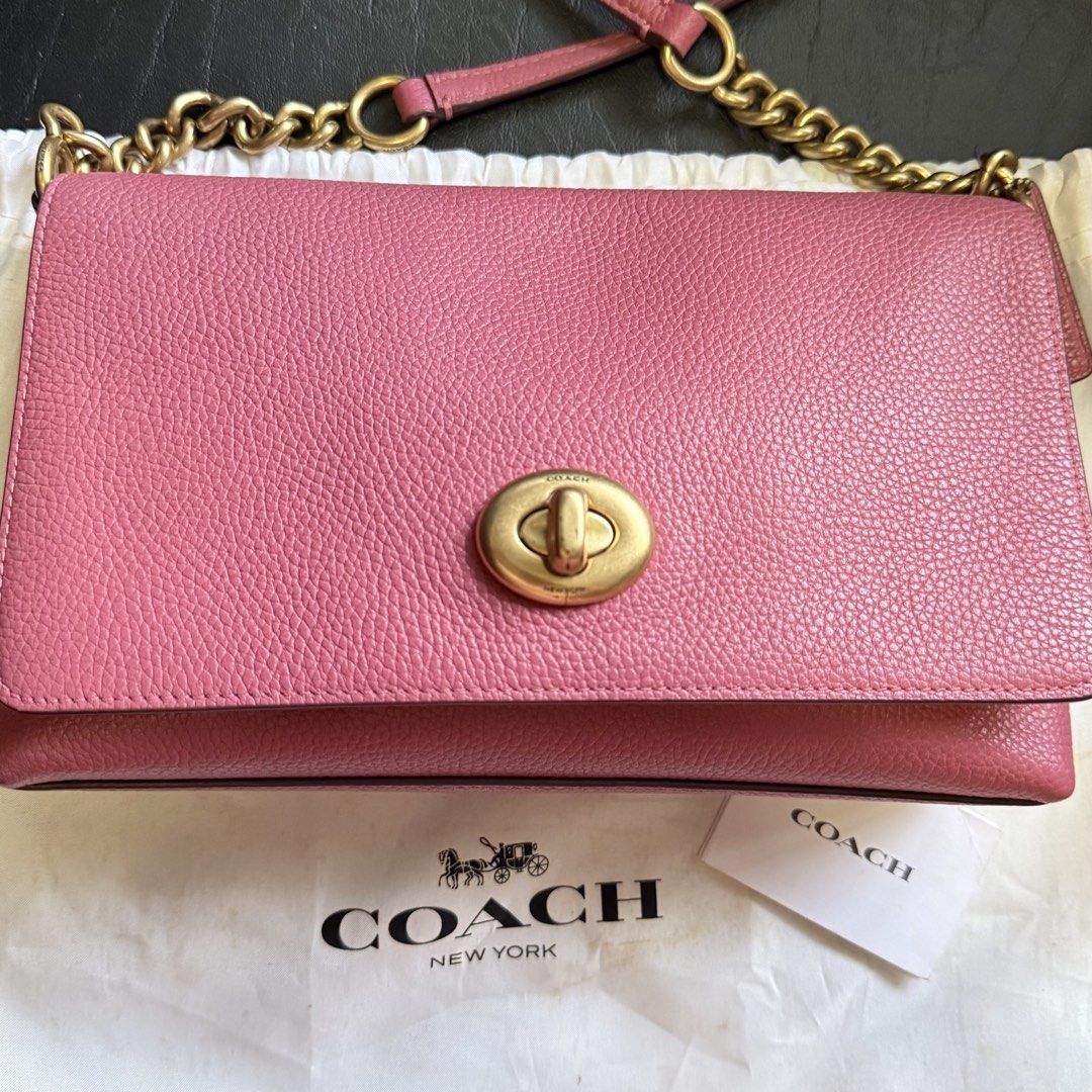 Coach Crosstown Crossbody Bag (Category: Luxury Bags & Wallets) located in Manila. Submitted by she_alice (Listing ID 1466327638, Image 1). Description: - Authentic Coach leather handbag in a gorgeous pink pebble grain - Elegant gold-tone hardware and secure front flap turnlock closure - Stylish chain and leather shoulder strap for comfortable wear - Features the iconic Coach creed patch - Includes original dust bag and care card - Can pass as br