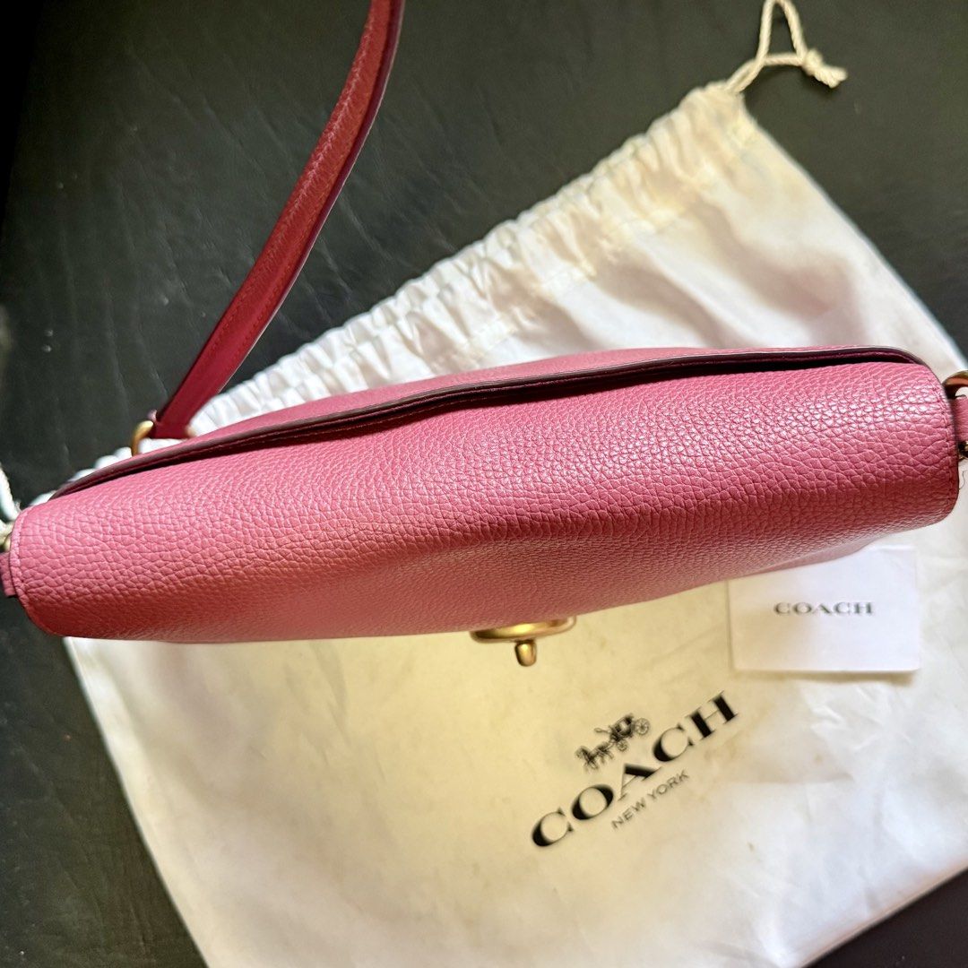 Coach Crosstown Crossbody Bag (Category: Luxury Bags & Wallets) located in Manila. Submitted by she_alice (Listing ID 1466327638, Image 3). Description: - Authentic Coach leather handbag in a gorgeous pink pebble grain - Elegant gold-tone hardware and secure front flap turnlock closure - Stylish chain and leather shoulder strap for comfortable wear - Features the iconic Coach creed patch - Includes original dust bag and care card - Can pass as br