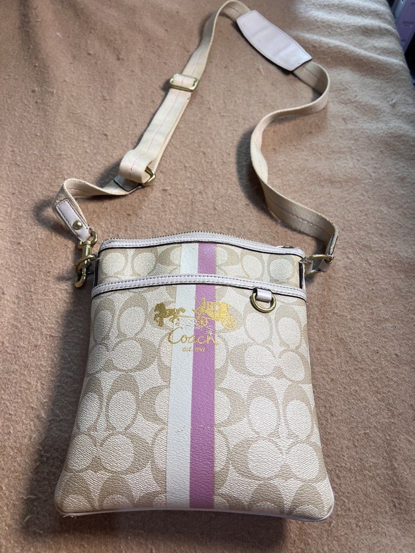 COACH HERITAGE SWINGPACK - Light Khaki Pink (Category: Cross-body Bags) located in Makati City. Submitted by carullee (Listing ID 1466224286, Image 1). Description: Preloved Japan Sourced Coach Heritage Swingpack With sign of use on corners Minor fading on front logo Needs clean on strap - shows dirt Washable dirt inside the bag Intact creed Hardware discoloration on some areas as sign of use and age Please manage tour expactations as this is a p