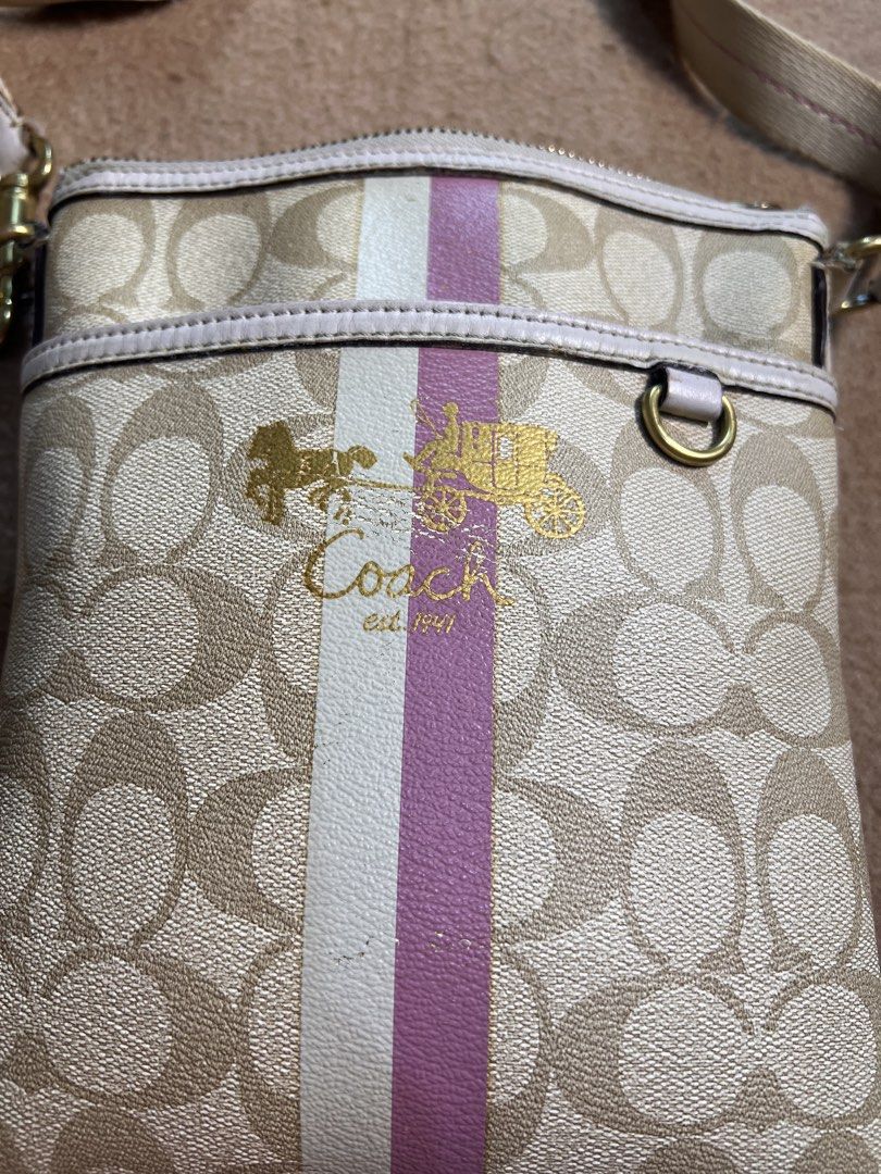 COACH HERITAGE SWINGPACK - Light Khaki Pink (Category: Cross-body Bags) located in Makati City. Submitted by carullee (Listing ID 1466224286, Image 2). Description: Preloved Japan Sourced Coach Heritage Swingpack With sign of use on corners Minor fading on front logo Needs clean on strap - shows dirt Washable dirt inside the bag Intact creed Hardware discoloration on some areas as sign of use and age Please manage tour expactations as this is a p