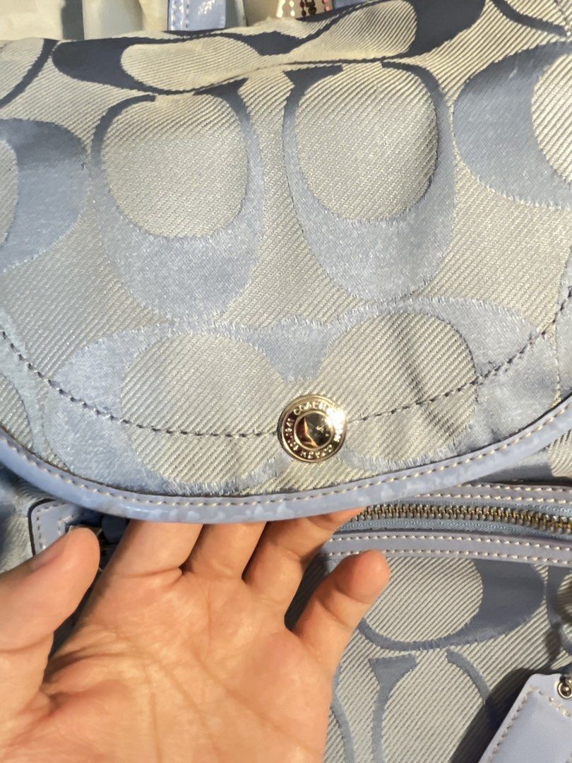 Coach Kyra Daisy Signature Backpack (Category: Backpacks) located in Muntinlupa City. Submitted by pique.unique (Listing ID 1466293267, Image 3). Description: Coach Kyra Daisy Signature Backpack in a light blue or periwinkle colorway - Authenticity Guaranteed - Rank AB - Medium BackPack - Rare Piece Very Classy Colorway Condition See Photos for details Asking Price: 5,500 Dm me If Interested 📩 Location: Muntinlupa City .
