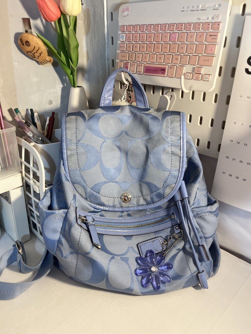 Coach Kyra Daisy Signature Backpack (Category: Backpacks) located in Muntinlupa City. Submitted by pique.unique (Listing ID 1466293267, Image 1). Description: Coach Kyra Daisy Signature Backpack in a light blue or periwinkle colorway - Authenticity Guaranteed - Rank AB - Medium BackPack - Rare Piece Very Classy Colorway Condition See Photos for details Asking Price: 5,500 Dm me If Interested 📩 Location: Muntinlupa City .