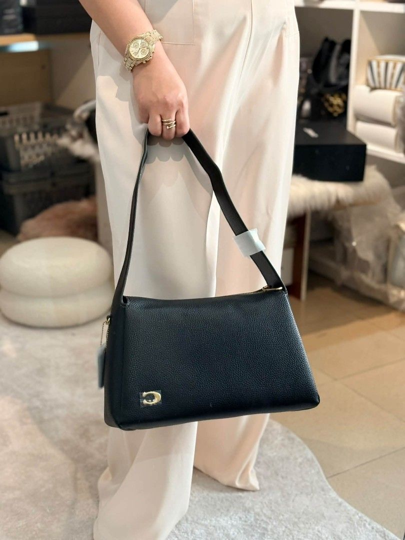 Coach Lola Shoulder Bag in Black (Category: Shoulder Bags) located in Quezon City. Submitted by bagsboutiqueph (Listing ID 1466334991, Image 1). Description: LAST PRICE POSTED. LIMITED STOCKS! BRANDNEW WITH INCLUSIONS. COLOR MAY SLIGHTLY VARY IN ACTUAL DUE TO LIGHTING AND CAMERA SETTING. OTHER PHOTOS WILL BE SEND DURING PURCHASE AND FOR SURE BUYERS ONLY. WHEN IN DOUBT, DO NOT ORDER. THANK YOU..