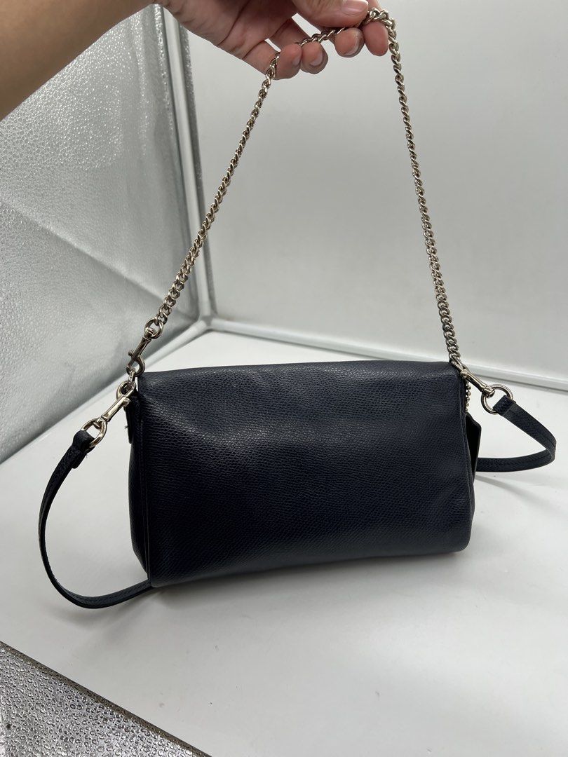 Coach Mini Ruby navy blue pebbled leather 2way shoulder chain Crossbody Bag (Category: Shoulder Bags) located in Cavite. Submitted by aellavier (Listing ID 1466171928, Image 3). Description: orig preloved auth. minor issue: black hangtag (not navy blue), needs minimal cleaning. may signs of use sa lining ng bag.