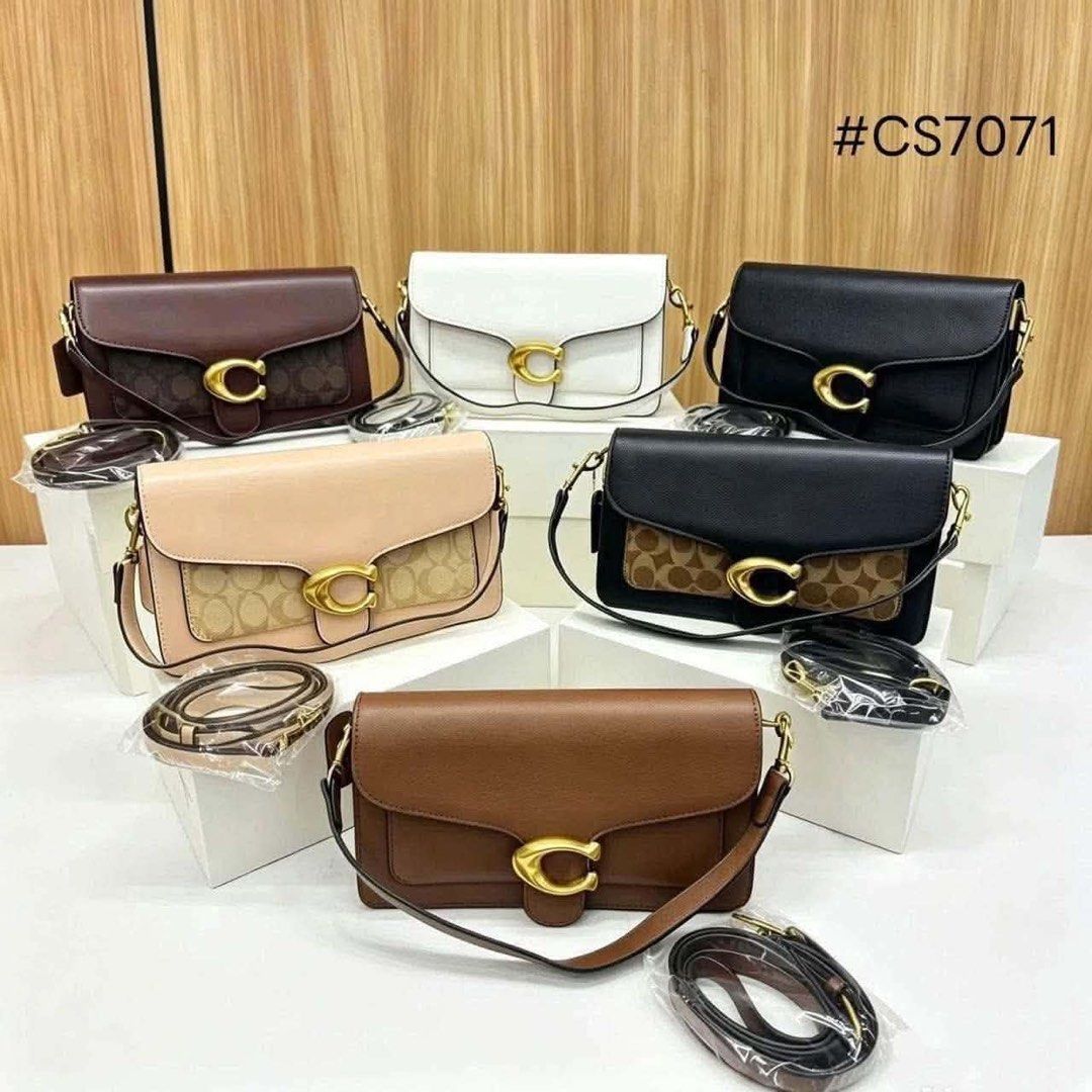 Coach Quilted Shoulder Bag Various Colors (Category: Shoulder Bags) located in Manila. Submitted by youngflower.11acf4 (Listing ID 1466187933, Image 2). Description: - Trendy curved hobo silhouette with a stylish quilted design - Secure zip top closure with elegant gold tone hardware - Features a comfortable short top handle plus a versatile extra strap - Accented with iconic Coach logo lettering on the front - Available in versatile solid colors