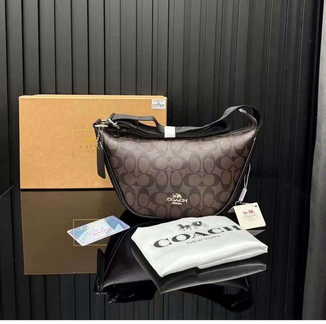 Coach Shoulder Bag (Category: Shoulder Bags) located in Quezon City. Submitted by stuffs.hellyy (Listing ID 1466318911, Image 3). Description: with box with paper bag premium! 🥰.