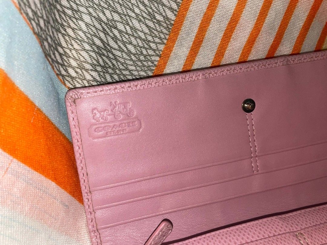 Coach Signature Pattern Long Wallet 44001 (Category: Wallets & Card holders) located in Legazpi City. Submitted by treasurebonbon (Listing ID 1466277325, Image 2). Description: The design is attractive with the new logo motor (metal fittings). Approx. : 9cm x 19cm x 1. 5 cm Signature Fabric x Leather trimming x Silver x Khaki x Rose .
