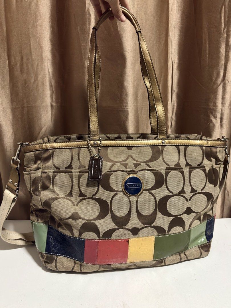 Coach Signature Stripe Multicolour Patchwork Tote Bag (Category: Luxury Bags & Wallets) located in Manila. Submitted by fifi.declutters (Listing ID 1466291521, Image 2). Description: price is negotiable :) just send me a message! - preloved bag, perfect work bag - interior is clean, no stains - classic monogram canvas with vibrant multicolored patent leather stripe - includes dual shoulder handles and an adjustable/detachable shoulder strap - ver