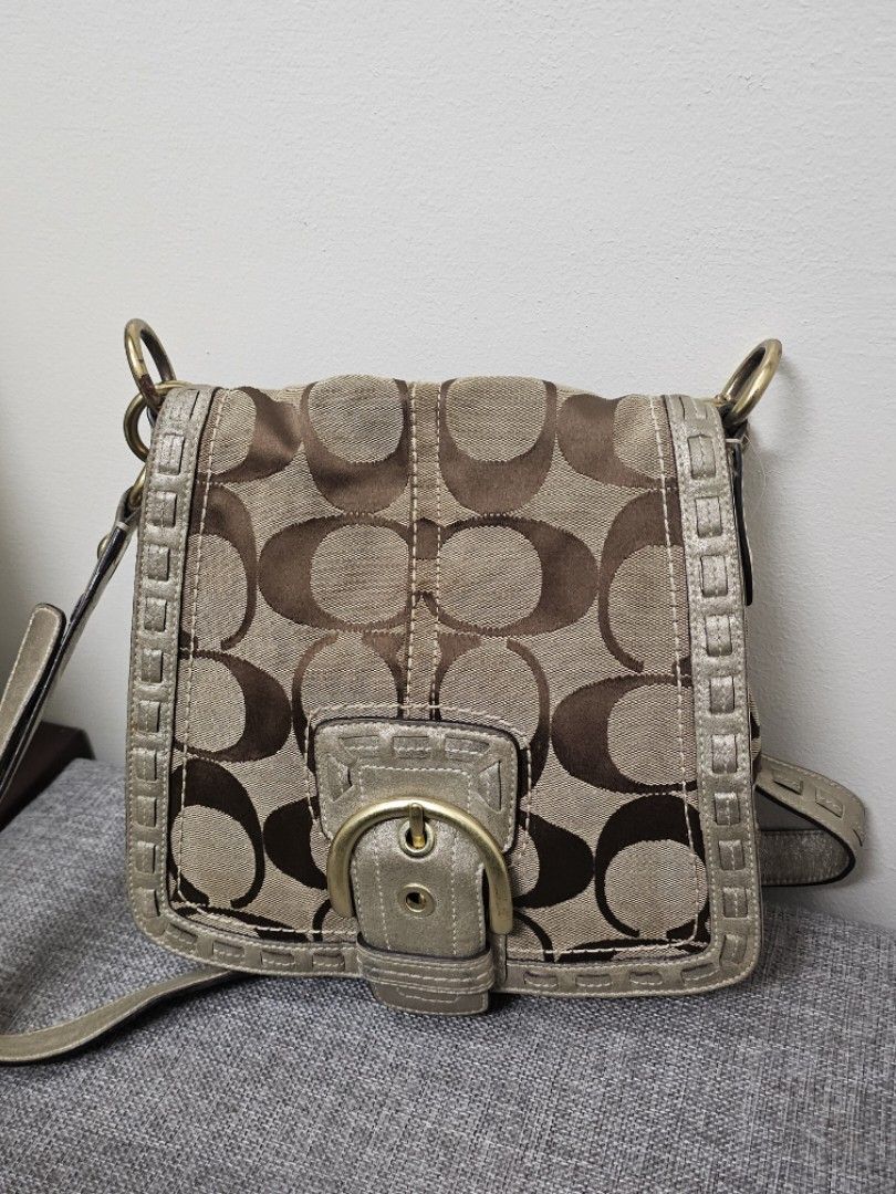 Coach Soho Signature Bag (Category: Shoulder Bags) located in Manila. Submitted by shopaholicmimi (Listing ID 1466252436, Image 1). Description: 📍📍preloved with flaws (please see photos) dirt not ergo, legacy, vintage, saddle, demi, zoe, carly, eastwest, patchwork, rare, canvas, signature, laurel, hobo.
