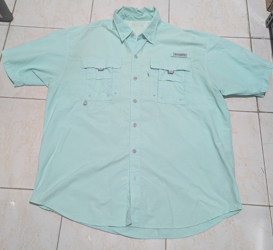 Columbia PFG shirt (Category: Tshirts & Polo Shirts ) located in Malabon City. Submitted by doobidoi (Listing ID 1466217197, Image 1). Description: - Brand/Model: Columbia PFG Fishing Shirt - Color: Light mint green - Size: Large - Width: 24" - Length: 29" Good condition - Closure: Button-up front - Features: Double chest pockets, rod holder loop, and mesh-lined upper back vent for airflow - Fabric: Lightweight and perfect for hot weather outdoor