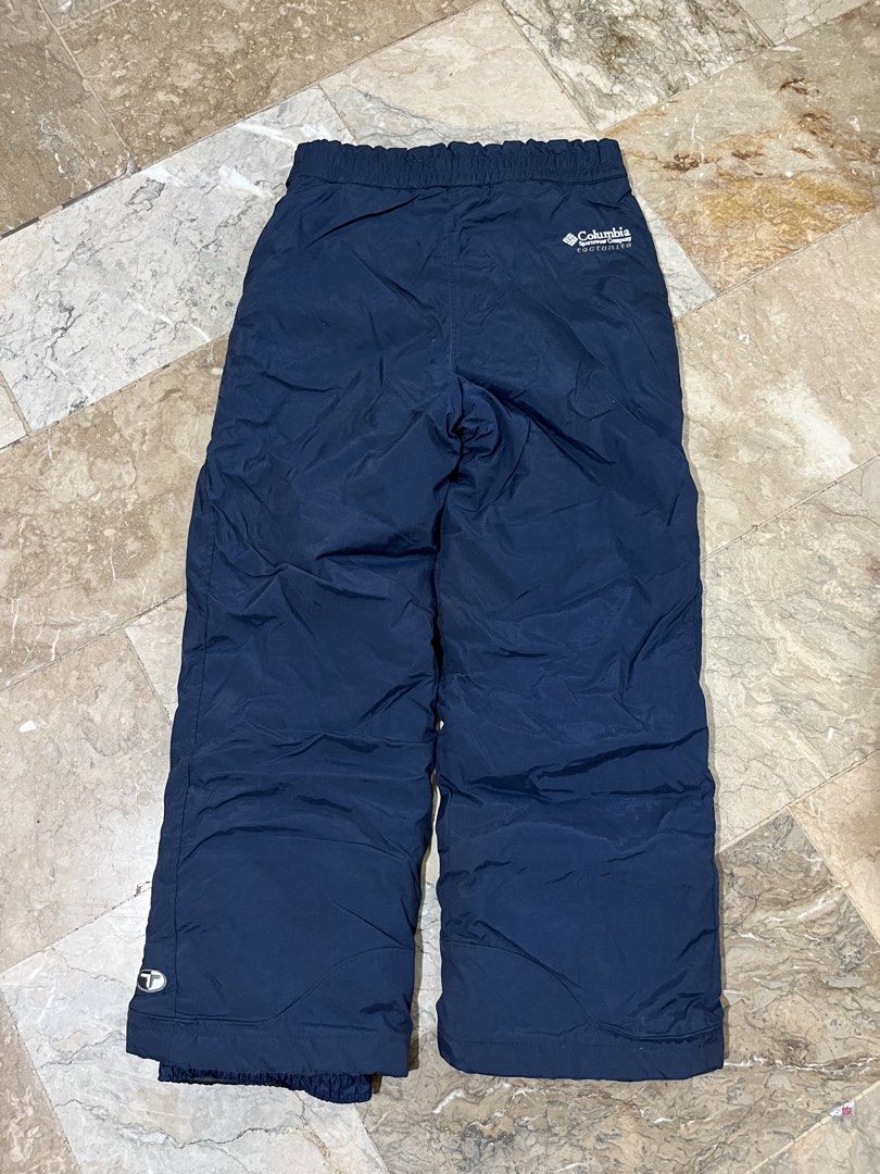 Columbia Tectonite Snow Pants Navy Blue Size 7/8 (Category: Babies & Kids Fashion) located in Tarlac. Submitted by thriftygoodss (Listing ID 1466268146, Image 2). Description: - Brand: Columbia Tectonite - Size: Kids 7/8 - Color: Navy blue - Features: Elastic waistband, integrated belt buckle, and button closure - Insulation: Tectonite insulated lining to lock in warmth - Material: Durable nylon built for cold weather and snow - Condition: Clean 