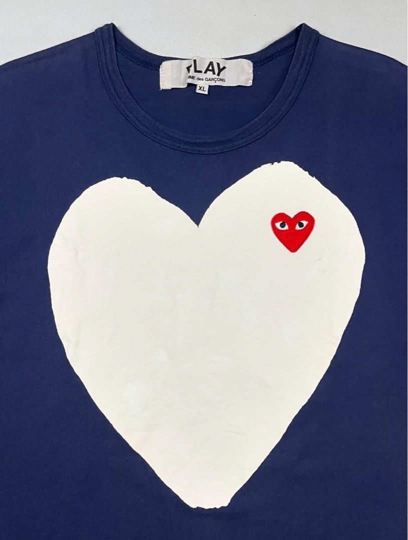 Comme des Garcons - Play Solid Heart Logo Tee (Category: Tshirts & Polo Shirts ) located in Puerto Princesa. Submitted by rrugsgallery (Listing ID 1466250727, Image 3). Description: Comme des Garcons - Play Solid Heart Logo Tee Tagged Size: XL Dimensions Length: 29 Width: 20 Condition: Excellent Color rate: 9.5 Flaws: None.