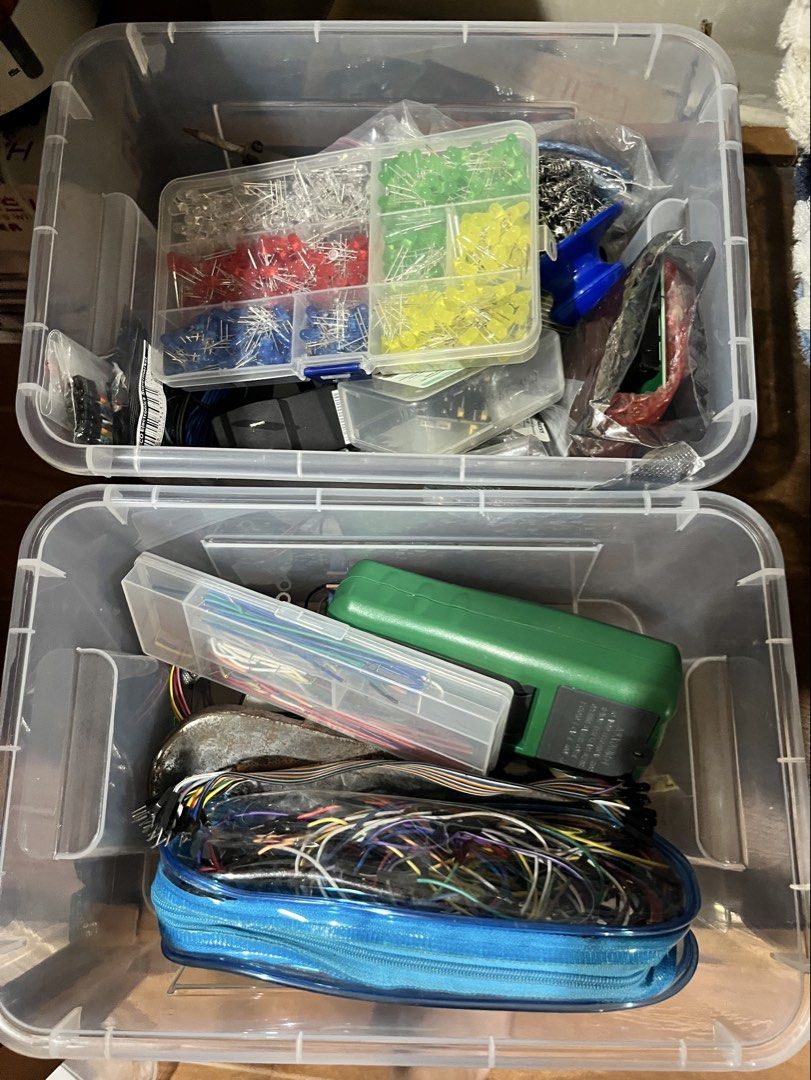 Computer Engineering Hardware Kit (Category: Craft Supplies & Tools) located in Carmona. Submitted by pierresilog (Listing ID 1466199047, Image 1). Description: - Massive DIY electronics parts lot, ideal for custom builds and repairs - Includes assorted colored LEDs (red, green, blue, yellow, clear) - Comes with various jumper wires and rainbow ribbon cables - Includes a microcontroller board (ESP32 and Arduino Uno with case) and digital multimet