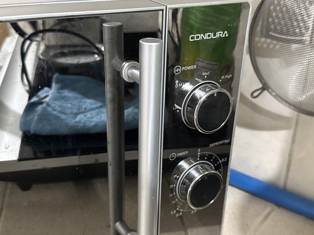 Condura Mechanical Microwave Oven 20L (Category: Ovens & Toasters) located in Caloocan City. Submitted by konmariwithcy (Listing ID 1466230903, Image 2). Description: Fully working microwave. Heats properly and all functions work. BUT Mica sheet is burnt and needs replacement, so selling as-is at a discounted price. Buyer can replace the mica sheet before use. Selling because upgrading. No returns/refunds..