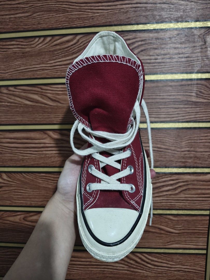 Converse Chuck 70 High Top Dark Red (Category: Sneakers) located in Baguio. Submitted by fordaluvofthrift2600 (Listing ID 1466170809, Image 3). Description: - Brand: Converse Chuck 70 High Top - Color: Dark Red canvas with classic white midsole and black piping - Details: Vintage heel license plate, silver metal eyelets, white laces - Size: US Men's 6 / Women's 8 (Equivalent to UK 4 / EUR 36.5-37) - Origin: Made in Vietnam - Condition: Clean inte
