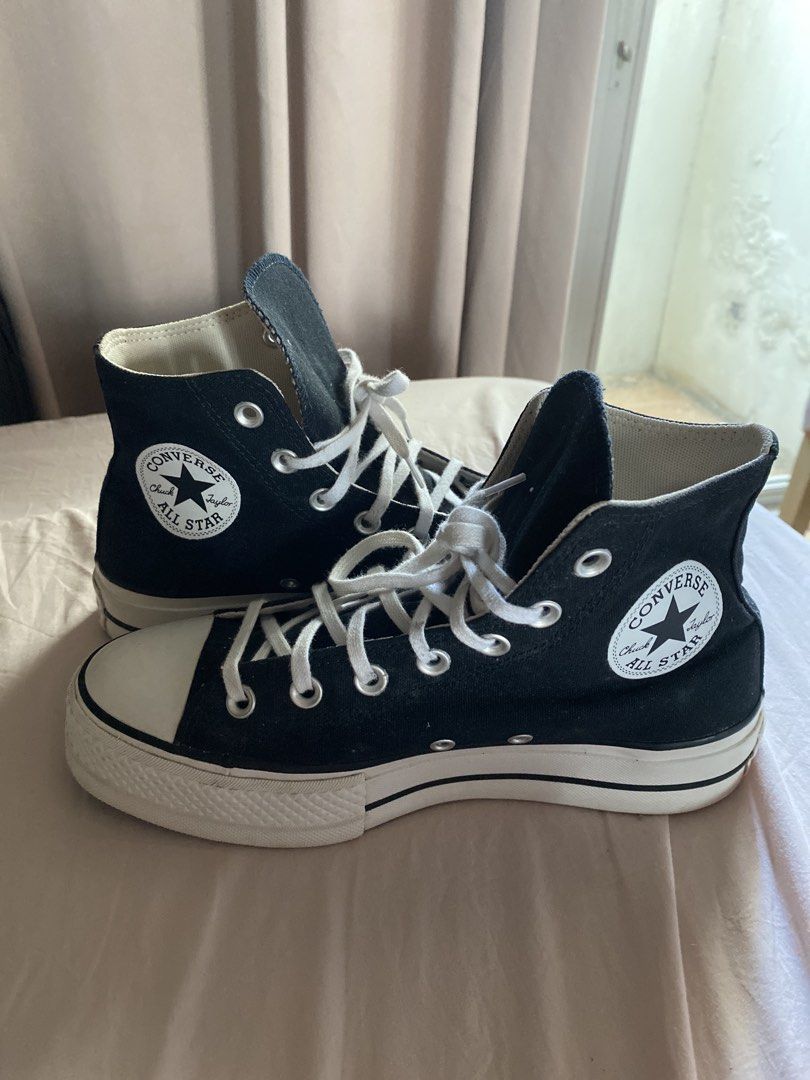 Converse Chuck Taylor All Star Platform High Top Black (Category: Sneakers) located in Pasig City. Submitted by marcspade (Listing ID 1466169387, Image 1). Description: - Brand: Converse (Authentic) - Style: High-top platform sneakers - Color: Black with white laces and toe caps - Size: US Women's 7.5 / UK 5.5 / EUR 38 (24.5 cm) - Condition: Clean uppers and inside with normal wear on soles and rubber sidings - Perfect versatile pair for everyday