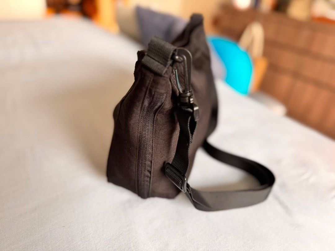 Convertible Nylon Shoulder Bag and Backpack (Category: Shoulder Bags) located in Manila. Submitted by flojo1220 (Listing ID 1466217594, Image 2). Description: - 2-in-1 Design: Easily converts from a stylish shoulder bag into a functional backpack using built-in zippered compartments and adjustable straps. - Durable Build: Made from tough, long-lasting nylon fabric equipped with sturdy black hardware and clip-on straps. - Colors Available: Classic