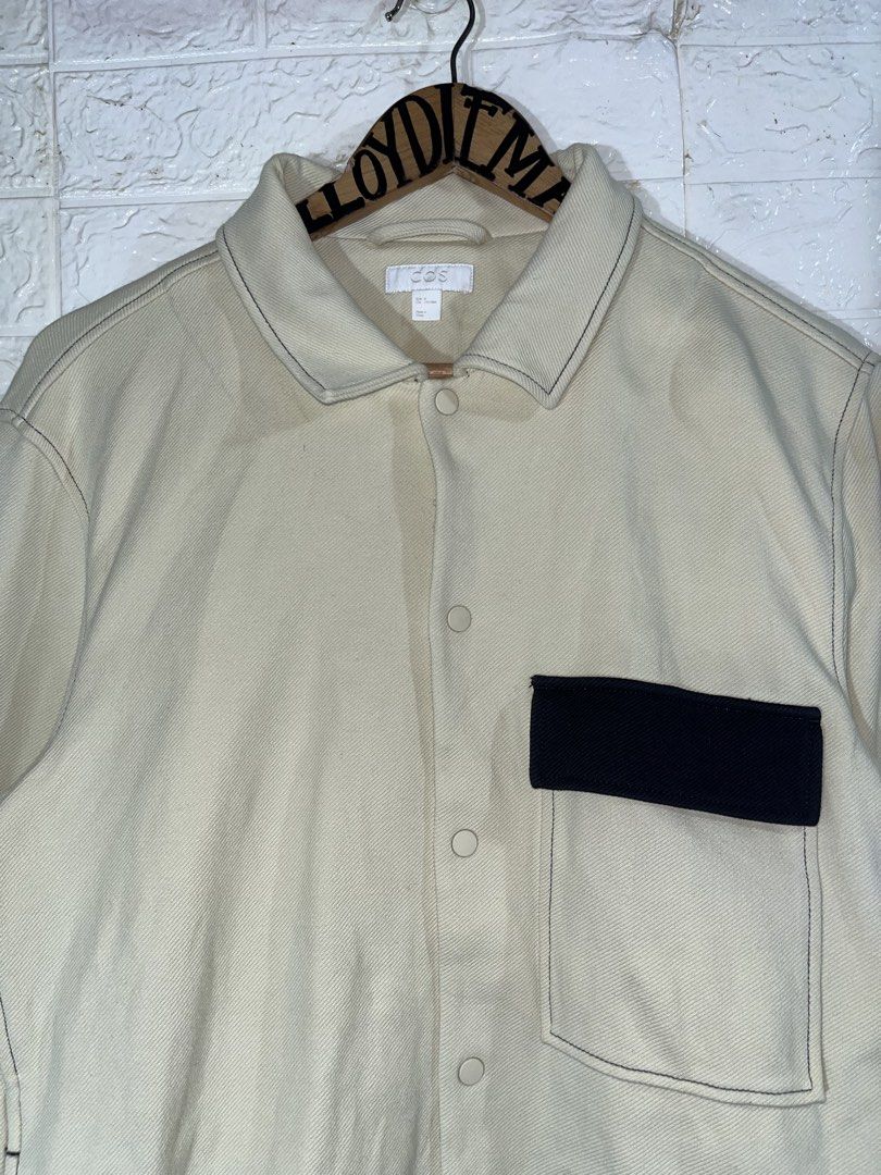 COS cream contrast stitch polo button down (Category: Coats, Jackets and Outerwear) located in Manila. Submitted by lloydiemmfmannn (Listing ID 1466244232, Image 2). Description: COS cream contrast stitch polo button down sz M on tag fits w21 l26.5 flaws: need wash pasay location.