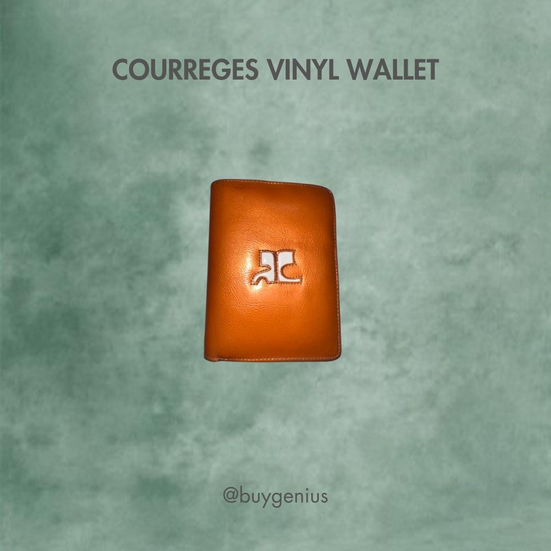 Courreges Vinyl Wallet (Category: Luxury Bags & Wallets) located in Davao. Submitted by buygenius (Listing ID 1466313293, Image 1). Description: • This vinyl Courreges wallet has 7 card slots, a coin purse, a slot for photos, and lots of slip pockets for receipts and other ephemera! The bill compartment is also divided into two sections in case you want to separate some bills. Color is even more eye-catching and playful IRL! • Flaws: due to the v