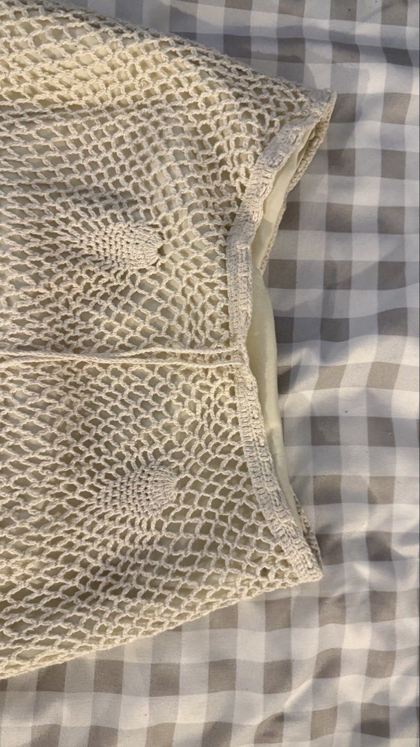 Cream Crochet Knit Skirt with Lining and Drawstring (Category: Skirts) located in Muntinlupa City. Submitted by addielejano (Listing ID 1466266967, Image 2). Description: Cream crochet knit skirt. Fully lined underneath so it's not see-through. Open mesh pattern with solid pineapple motifs scattered throughout. Scalloped hem at the bottom. Drawstring waist with tassel ends. Midi length, flowy fit. fits M-L.