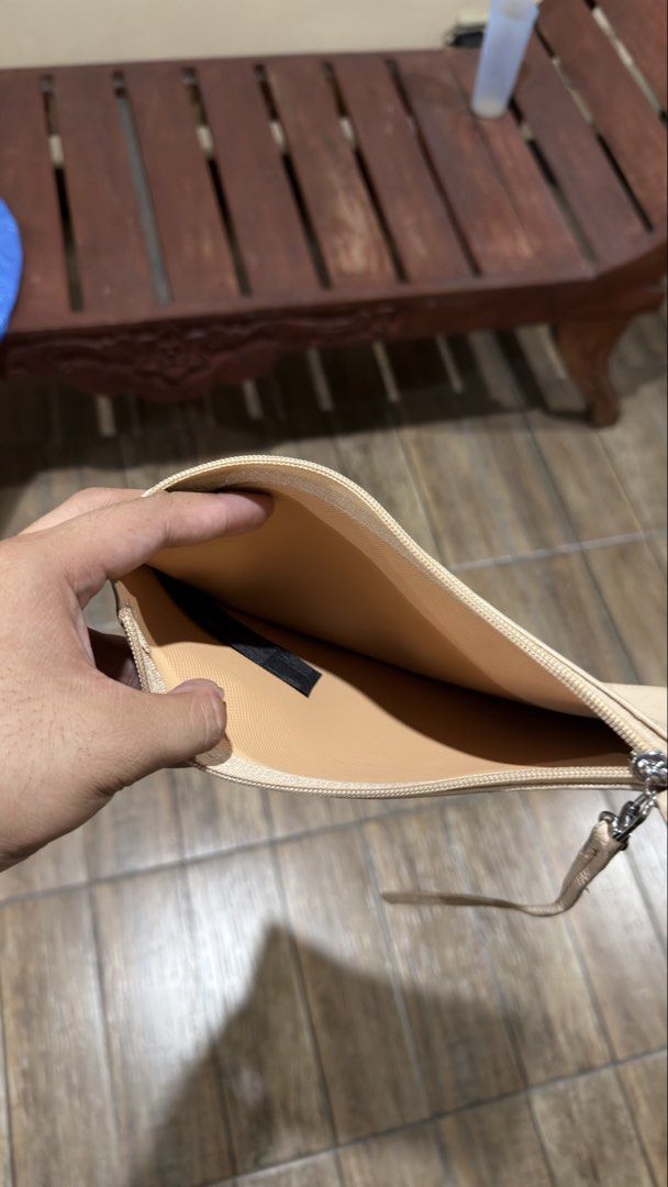 CREAM LACOSTE POUCH BAG (Category: Belt bags, Clutches and Pouches) located in Manila. Submitted by urban-vintage_2 (Listing ID 1466293542, Image 3). Description: ISSUE: NONE (NEED WASH) MOP :GCASH (NO COD) SHIP VIA: LALAMOVE & J&T LOCATION: PASIG CITY .