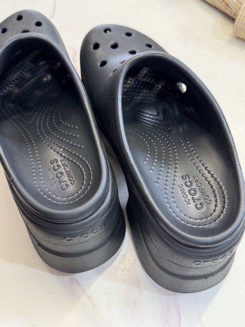 Crocs Classic Platform Clog Black Size M6 W8 (Category: Slippers and slides) located in San Juan City. Submitted by khaye1123 (Listing ID 1466164902, Image 3). Description: - Color: Black - Size: Men's US 6 / Women's US 8 - Style: Platform clogs with chunky sole - Material: Lightweight foam construction - Features: Iconic comfort footbed, breathable ventilation ports, slip-on design - Condition: Soles show clean tread patterns with visible sizing