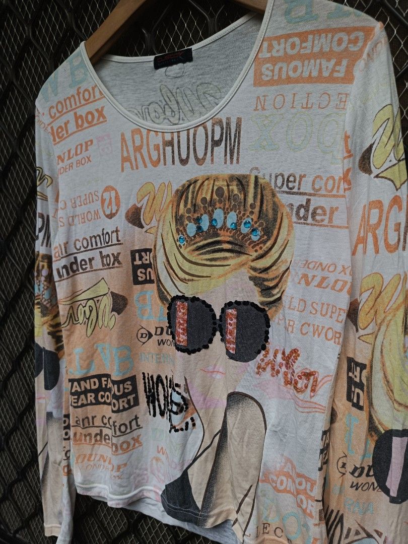 Custo Barcelona Graphic AOP Top (Category: Longsleeves) located in Muntinlupa City. Submitted by eksenathriftshop (Listing ID 1466195211, Image 2). Description: Good Condition issue: 1 hole and pinhole and missing some sequins (check photo).