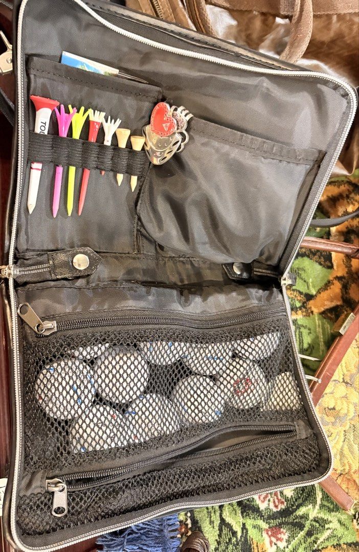 Cutter & Buck Black Woven Golf Accessory Bag (Category: Golf) located in Tarlac. Submitted by therusticaddict (Listing ID 1466247756, Image 3). Description: - Brand: Cutter & Buck - Color: Black woven material - Storage: Spacious main compartment with dedicated golf tee slots and zippered mesh pocket - Includes: Free golf balls, adjustable shoulder strap, and branded luggage tag - Condition: Excellent, ready for the green -GET ALL.