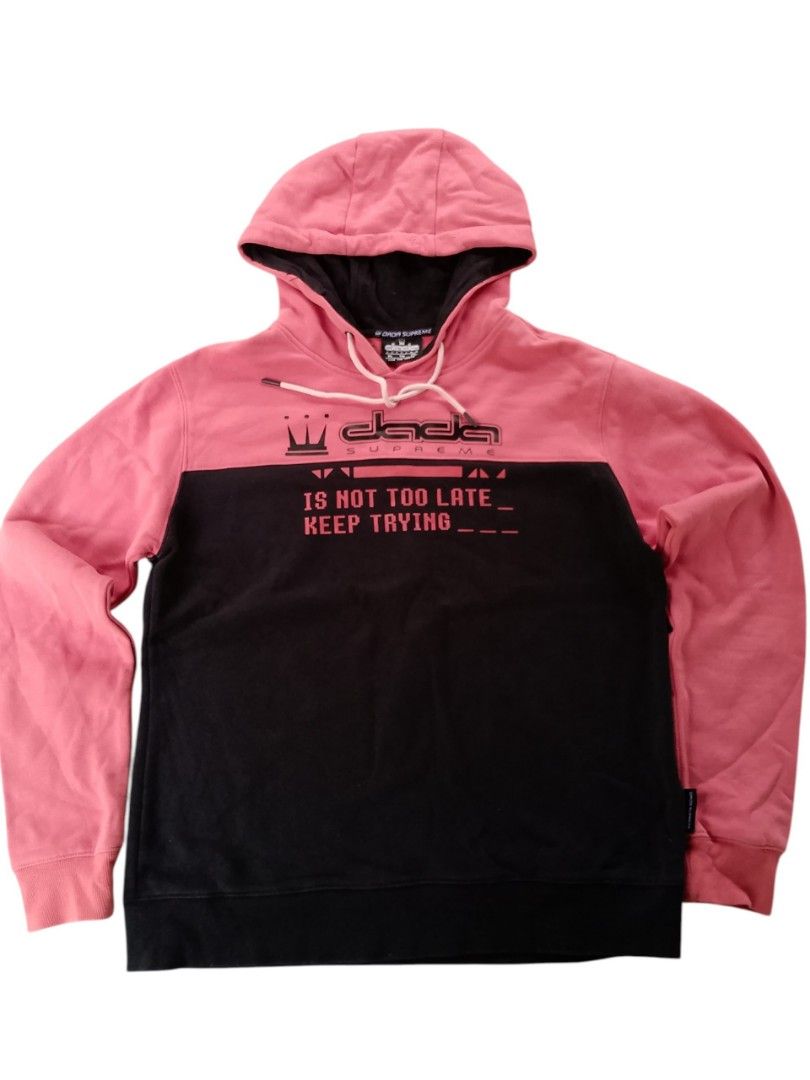 Dada Supreme (Category: Hoodies) located in Manila. Submitted by poisonthrift (Listing ID 1466224693, Image 1). Description: - Brand: Dada Supreme - Design: Bold 'IS NOT TOO LATE KEEP TRYING' chest graphic with crown logo and branding - Details: Drawstring hood with embroidered lettering, ribbed cuffs and hem - Material: Comfortable, heavyweight fabric .