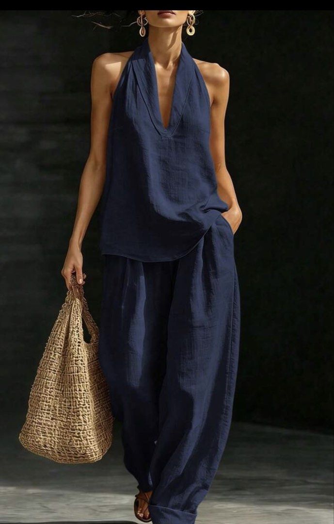 Dark Blue Deep Neck Sleeveless Top with Pants (Category: Sets or Coordinates) located in Iloilo. Submitted by dabyladaby2 (Listing ID 1466264712, Image 1). Description: Once used Pants- waist 25.6 in - 35 in. Garterized Hip - 45.7 , length - 41 in , inseam 28 in Top- chest - 37 in , length- 24 in .