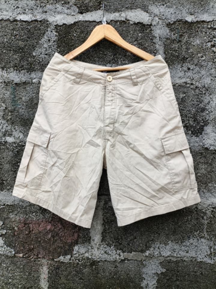 DC Shoes Beige Cargo Shorts Size 30 (Category: Shorts) located in Aloran. Submitted by shangzr (Listing ID 1466280552, Image 1). Description: - Brand: DC Shoes - Size: 30 waist - Color: Classic beige - Material: Durable cotton fabric - Closure: Button fly - Features: Multiple utility pockets on sides and back - Style: Casual skate wear, great for everyday use.