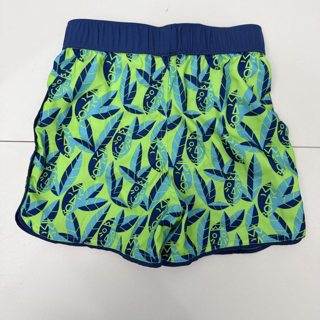 Decathlon shorts green blue pattern size 2-3 years (Category: Babies & Kids Fashion) located in Pasig City. Submitted by boymom20 (Listing ID 1466196432, Image 2). Description: - Size: 2-3 years (89-95 cm) - Design: Green and blue tribal-style face and leaf all-over print - Waistband: Solid blue elastic waistband for a comfortable fit - Lining: Built-in mesh lining - Ideal for: Swimming, pool days, and trips to the beach - Origin: Made in China L