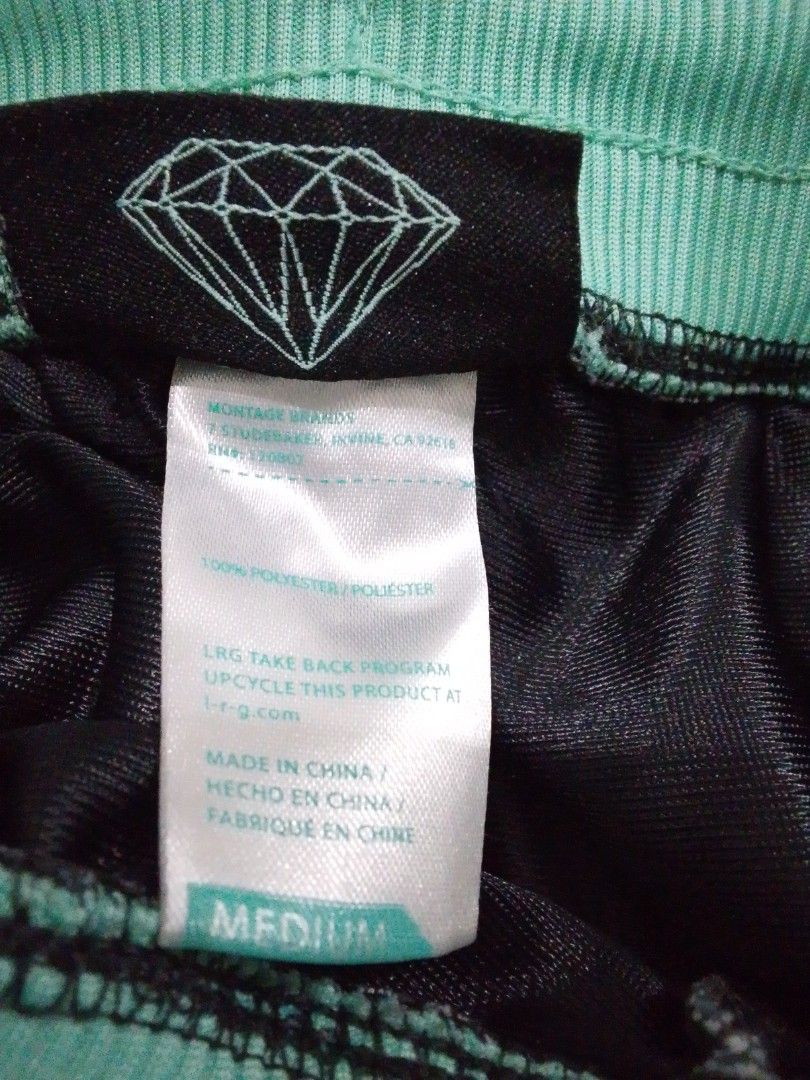Diamond Supply Co. Black Striped Shorts Medium (Category: Shorts) located in Quezon City. Submitted by zealstone_baf57c (Listing ID 1466336735, Image 3). Description: - Brand: Diamond Supply Co. - Condition: Excellent / Like New - Size: Medium - Design: Black and white stripes with mint green waistband and matching cursive logo - Features: Adjustable drawstring waist - Material: 100% lightweight polyester - Retail Price: $80 on official site - Mo