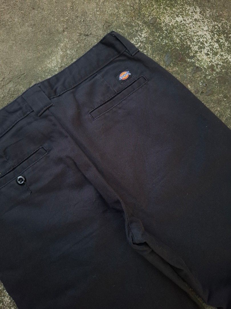 Dickies Flex Slim Taper Black Pants - Size 30 (Category: Trousers) located in Manila. Submitted by bonaobrag55538 (Listing ID 1466203649, Image 3). Description: - Brand: Dickies - Style: Flex slim taper workwear pants - Color: Black - Size: 30 waist - Measurements: 39" length, 7.5" leg opening - Material: Comfortable stretch fabric - Details: Left back pocket with button closure, iconic logo patch above right back pocket - Condition:Need Clean in