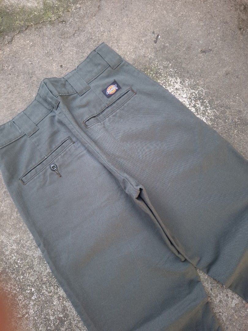 Dickies Flex Slim Taper Olive Green Pants Size - 28 (Category: Trousers) located in Manila. Submitted by bonaobrag55538 (Listing ID 1466202377, Image 3). Description: - Brand/Model: Dickies Flex Slim Taper Pants - Color: Olive Green - Size: Waist 28 | Length 39 | Leg Opening 8 - Material: Comfortable, stretchable fabric for easy movement - Details: Button closure, zipper fly, multiple utility pockets, and iconic back pocket logo patch - Condition
